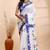 White & blue handloom saree with intricate applique work and floral artistic border