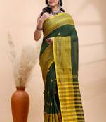 Dark green handloom cotton saree with yellow traditional border & intricate weaving design