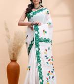 White & green  handloom saree with intricate applique work and floral artistic border