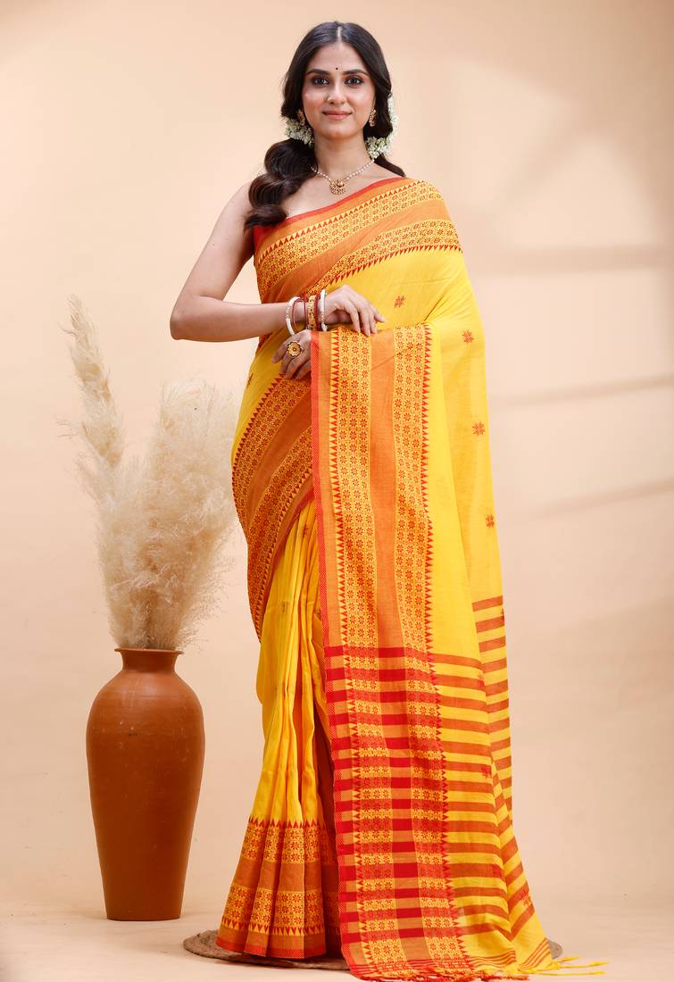 Yellow  handloom cotton saree with red traditional border & intricate weaving design