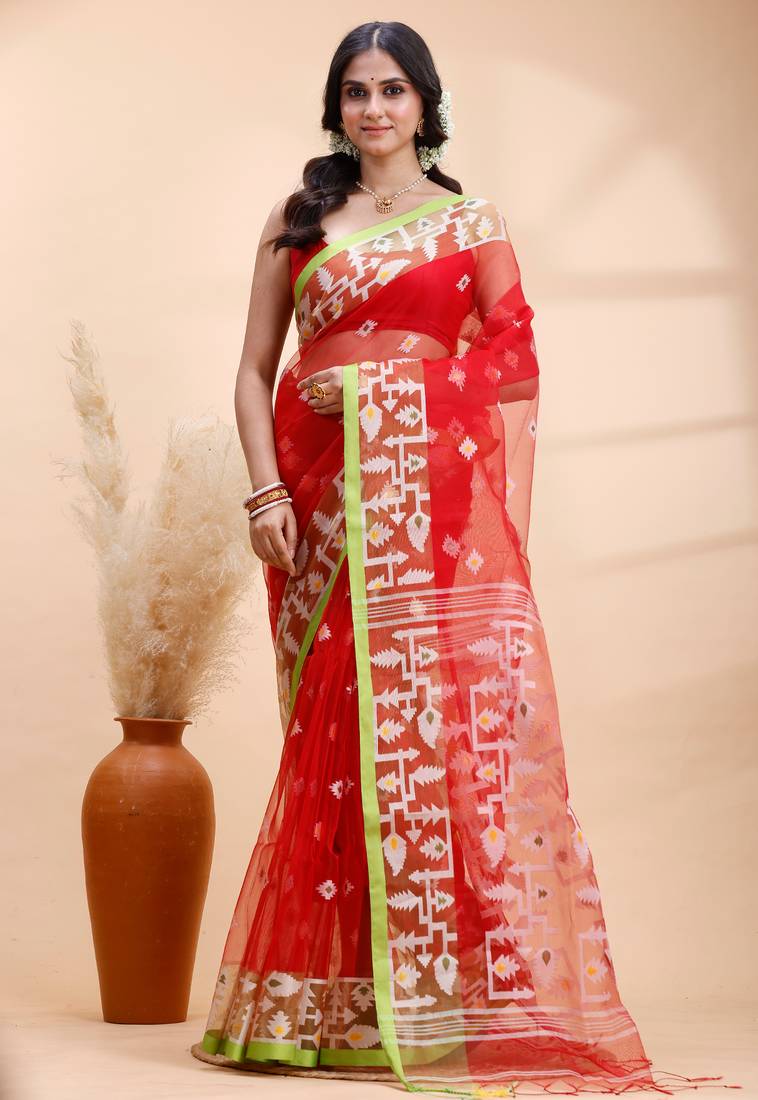 Red muslin saree with delicate jamdani motifs and green contrast border
