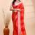 Red chiffon saree with elegant striped weave and subtle silver border detailing
