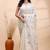 Gray handloom cotton saree with delicate blue and copper floral buti and artistic woven pallu