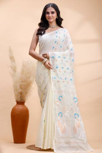 Ivory handloom cotton saree with delicate blue and golden floral buti and artistic woven pallu