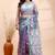Pigeon blue dual toned muslin saree with delicate jamdani motifs and graceful contrast border