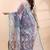 Pigeon blue dual toned muslin saree with delicate jamdani motifs and graceful contrast border