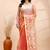 Coral dual toned muslin saree with delicate jamdani motifs and graceful contrast border