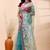 Sea green dual toned muslin saree with delicate jamdani motifs and graceful contrast border