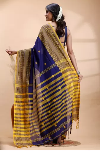 Blue handloom saree with yellow traditional border & intricate weaving design