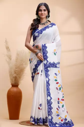White & blue handloom saree with intricate applique work and floral artistic border