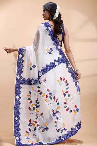 White & blue handloom saree with intricate applique work and floral artistic border