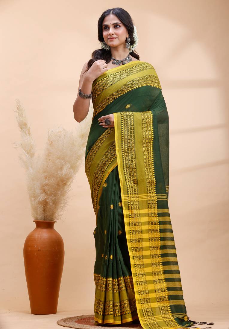 Dark green handloom cotton saree with yellow traditional border & intricate weaving design