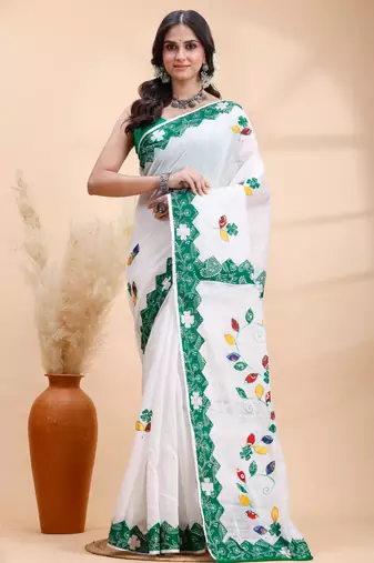 White & green  handloom saree with intricate applique work and floral artistic border