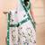 White & green  handloom saree with intricate applique work and floral artistic border