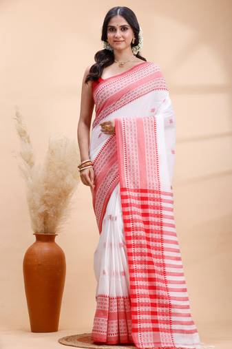 White handloom cotton saree with red traditional border & intricate weaving design