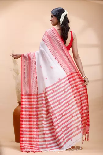 White handloom cotton saree with red traditional border & intricate weaving design