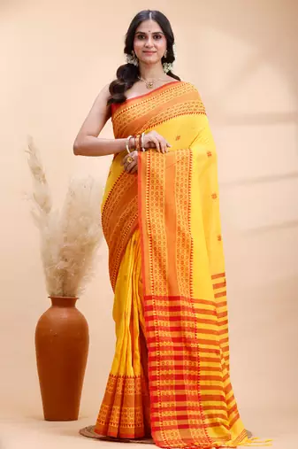 Yellow  handloom cotton saree with red traditional border & intricate weaving design
