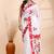 White & red handloom saree with intricate applique work and floral artistic border
