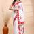 White & red handloom saree with intricate applique work and floral artistic border