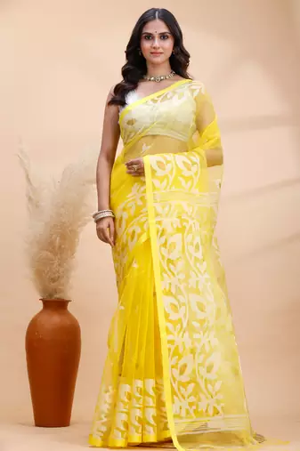 Yellow and white muslin saree with delicate jamdani motifs and self border