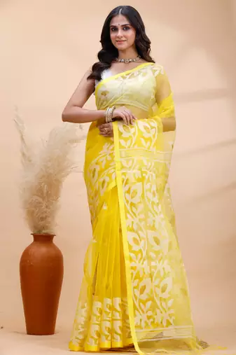 Yellow and white muslin saree with delicate jamdani motifs and self border
