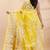 Yellow and white muslin saree with delicate jamdani motifs and self border