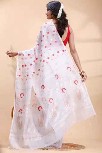 White handloom cotton saree with delicate red and golden floral buti and artistic woven pallu