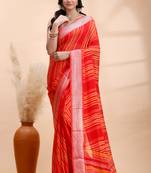Red chiffon saree with elegant striped weave and subtle silver border detailing