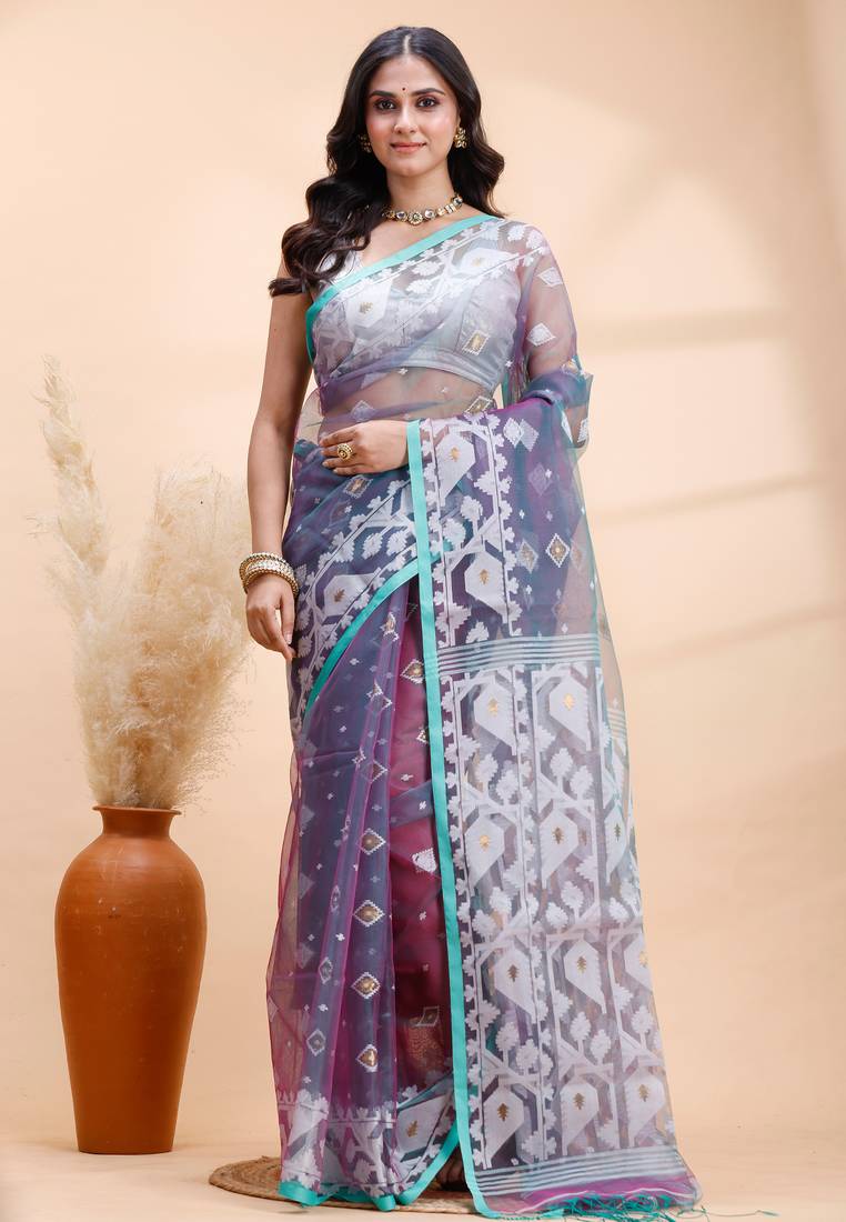 Pigeon blue dual toned muslin saree with delicate jamdani motifs and graceful contrast border