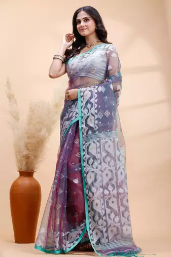 Pigeon blue dual toned muslin saree with delicate jamdani motifs and graceful contrast border
