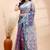 Pigeon blue dual toned muslin saree with delicate jamdani motifs and graceful contrast border