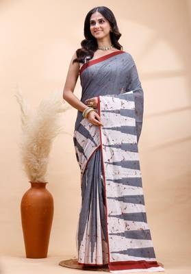 Gray malmal cotton saree with abstract white pallu and subtle red accents 2