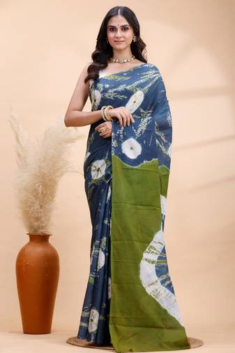 Indigo and olive bagru malmal cotton saree with artistic tie-dye circles & vibrant handcrafted patterns
