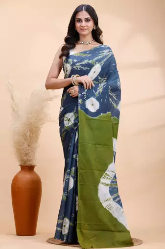 Indigo and olive bagru malmal cotton saree with artistic tie-dye circles & vibrant handcrafted patterns