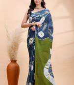 Indigo and olive bagru malmal cotton saree with artistic tie-dye circles & vibrant handcrafted patterns