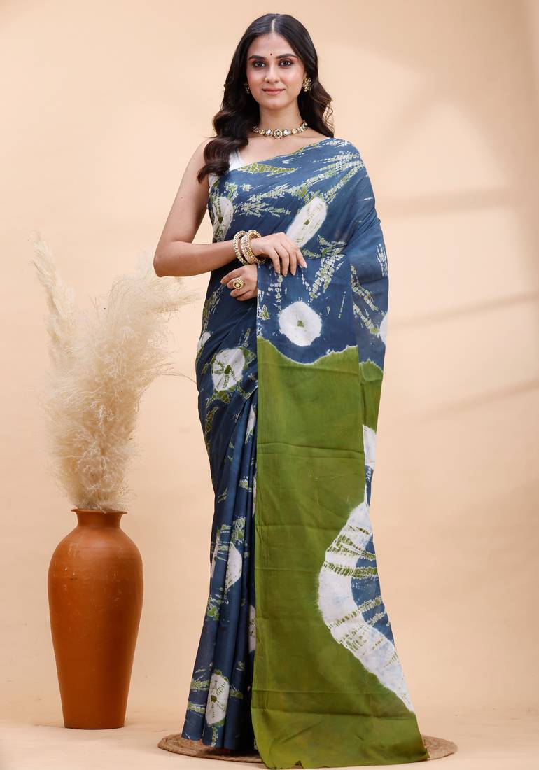 Indigo and olive bagru malmal cotton saree with artistic tie-dye circles & vibrant handcrafted patterns