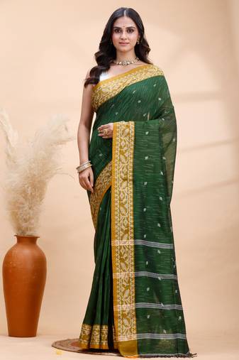 Dark green handloom cotton saree with mustard yellow heritage border