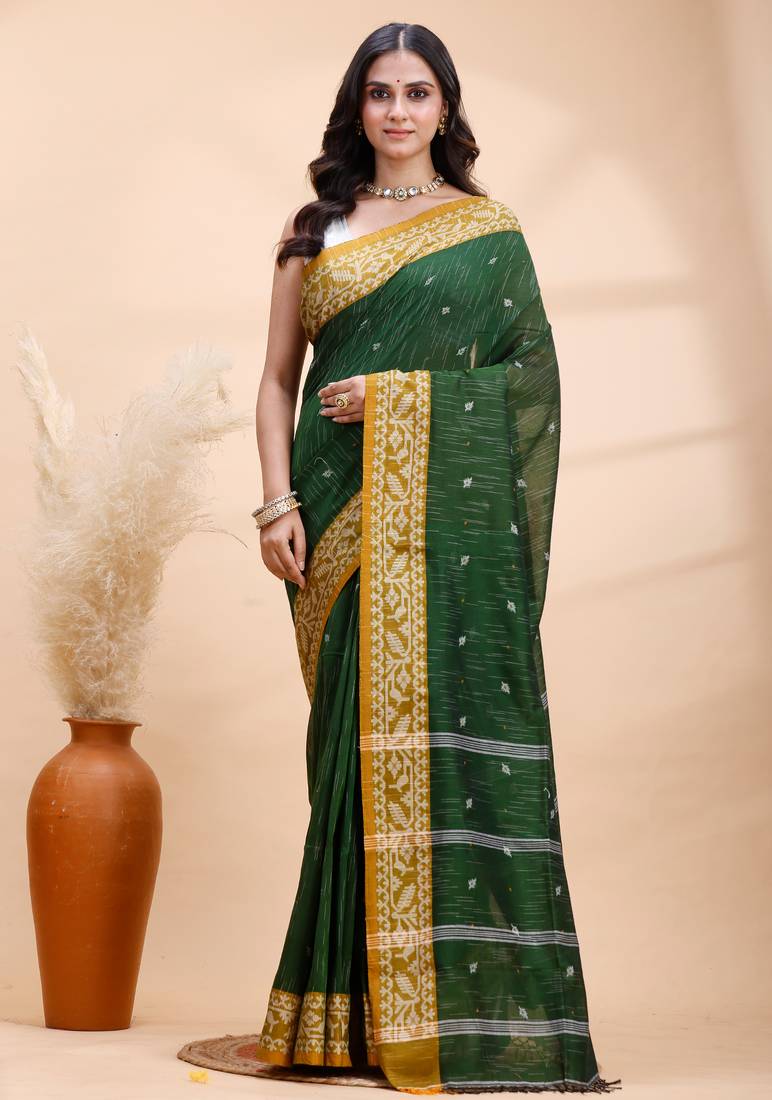 Dark green handloom cotton saree with mustard yellow heritage border