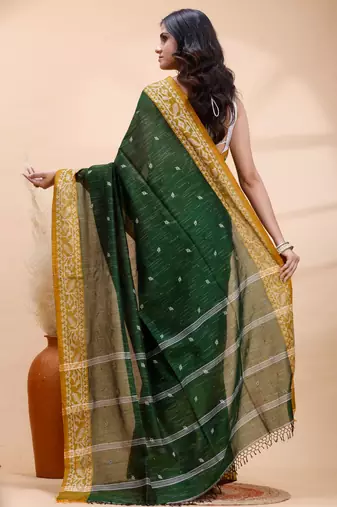 Dark green handloom cotton saree with mustard yellow heritage border