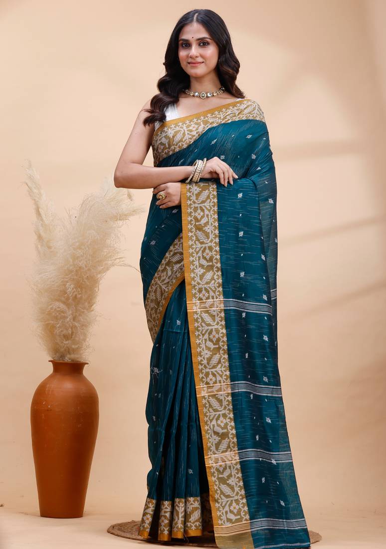 Dark teal green handloom cotton saree with mustard yellow heritage border