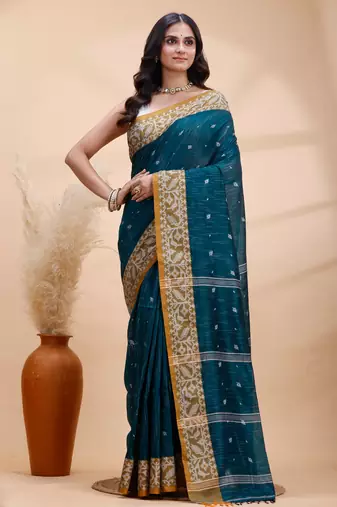 Dark teal green handloom cotton saree with mustard yellow heritage border