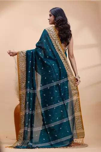 Dark teal green handloom cotton saree with mustard yellow heritage border