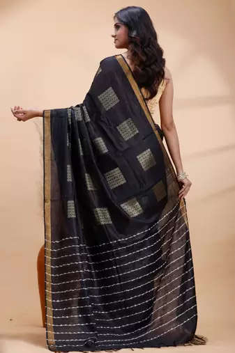 Black soft silk blend saree with gold zari motifs and border