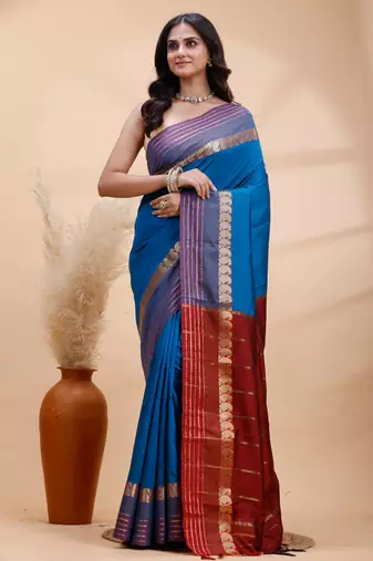Royal blue kanjivaram silk blend saree with purple border & red zari pallu