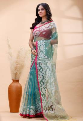 Sea green dual toned muslin saree with delicate jamdani motifs and graceful contrast border 2
