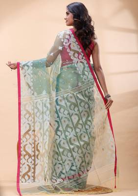 Sea green dual toned muslin saree with delicate jamdani motifs and graceful contrast border 3
