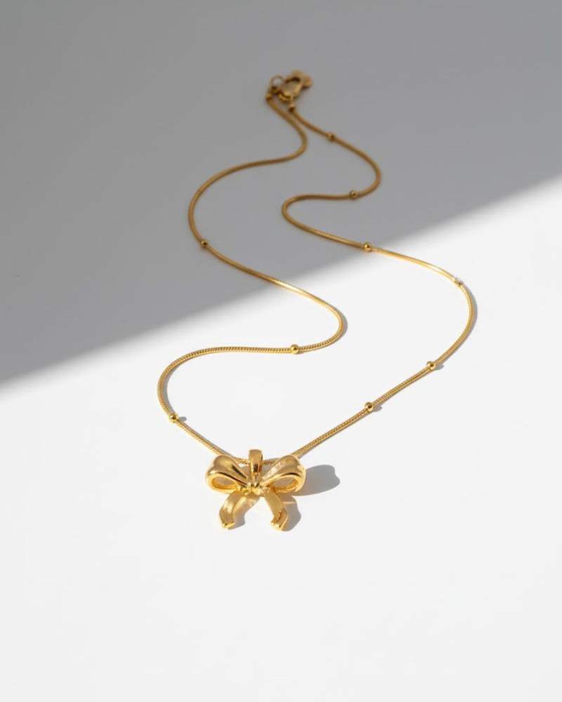 The aria bow pendant necklace