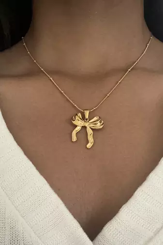 The aria bow pendant necklace