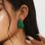 Emerald green crystal teardrop statement earrings
