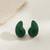 Emerald green crystal teardrop statement earrings
